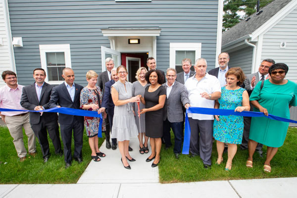 RI celebrates two new affordable housing developments, child care center