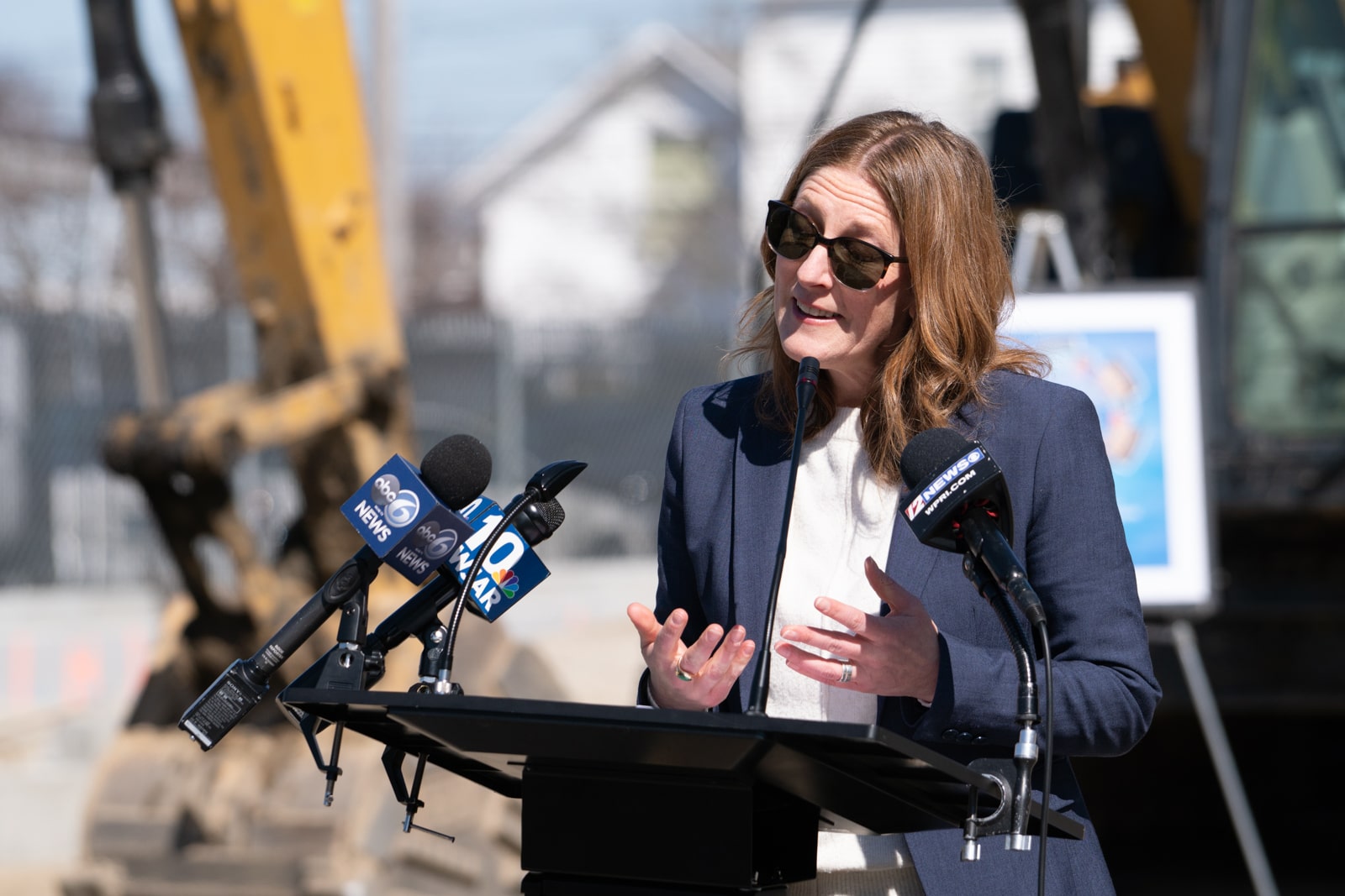 Jennifer Hawkins, Executive Director of ONE Neighborhood Builders, speaks at the groundbreaking event for the Residences at Riverside Square in East Providence on Monday, April 10, 2023. Photo by Stephen Ide/ONE Neighborhood Builders