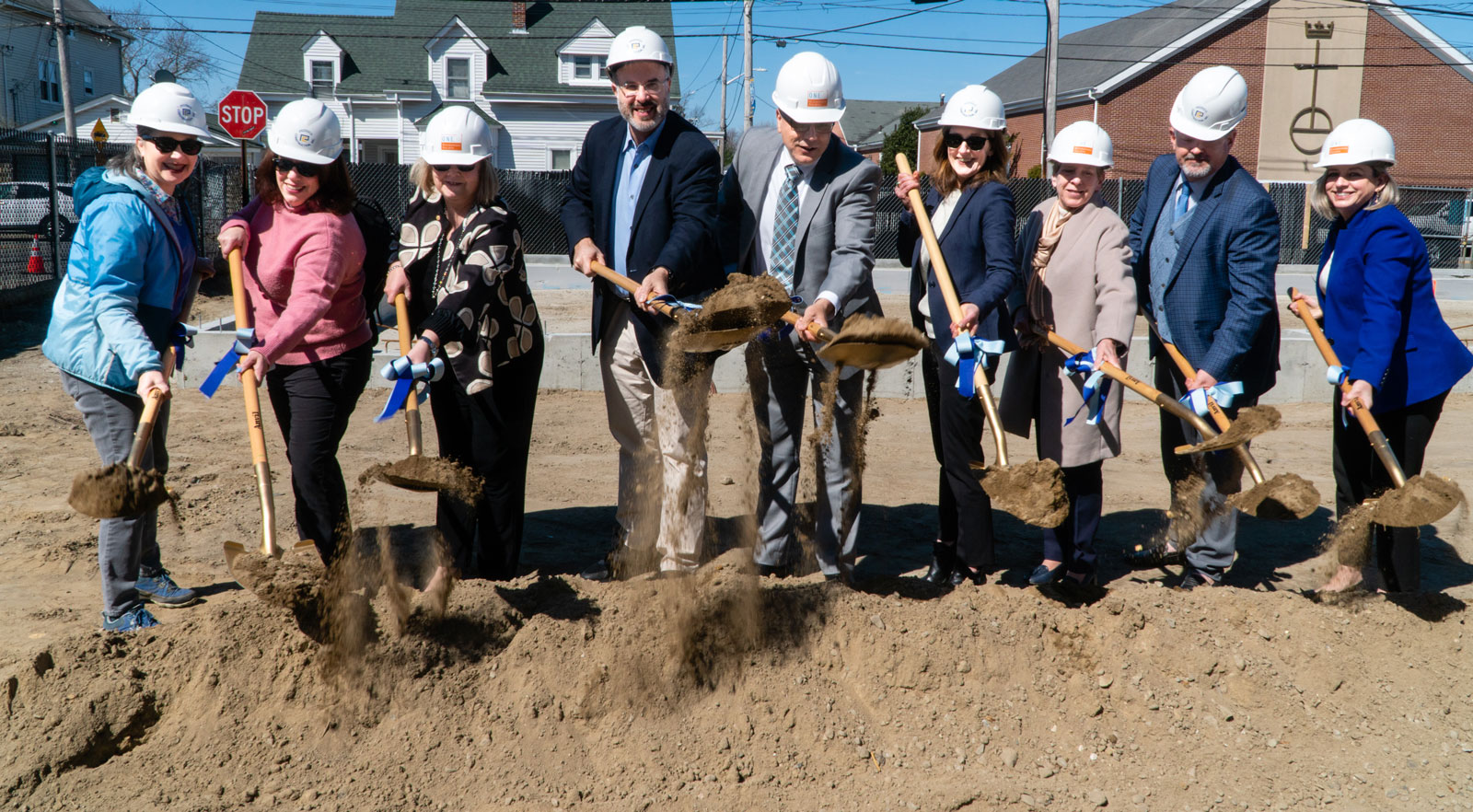 Officials break ground for the Residences at Riverside Square