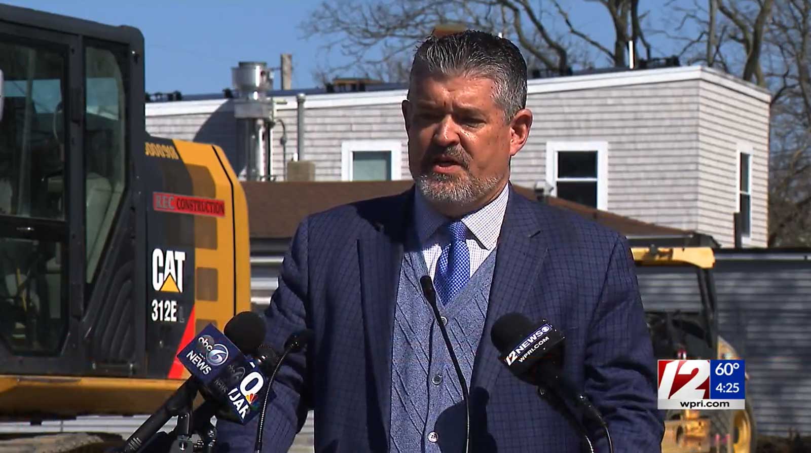 Rep. Matthew Dawson speaks at the groundbreaking event for the Residences at Riverside Square on Monday, April 10, 2024. Image screengrab from WPRI.