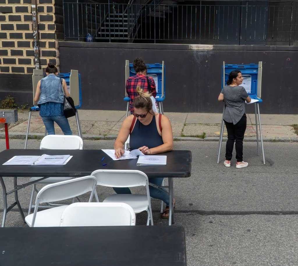Residents in central Providence vote on neighborhood improvement and community projects in June 2023 in a participatory budgeting effort. STEPHEN IDE/ONE Neighborhood Builders